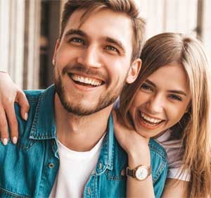 a couple happy that they learned what is tms therapy